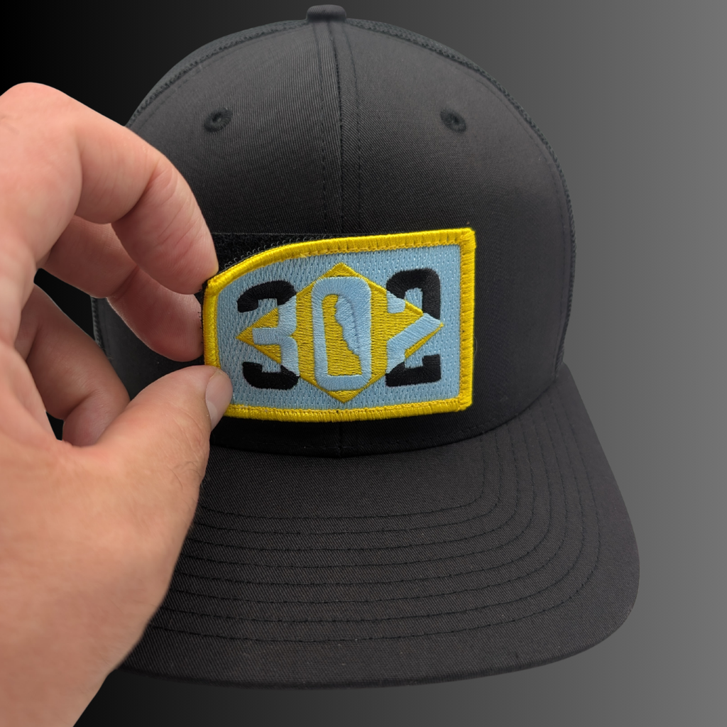 Delaware 302 patch on Richardson 112 trucker hat - RADISH -  Black/Black