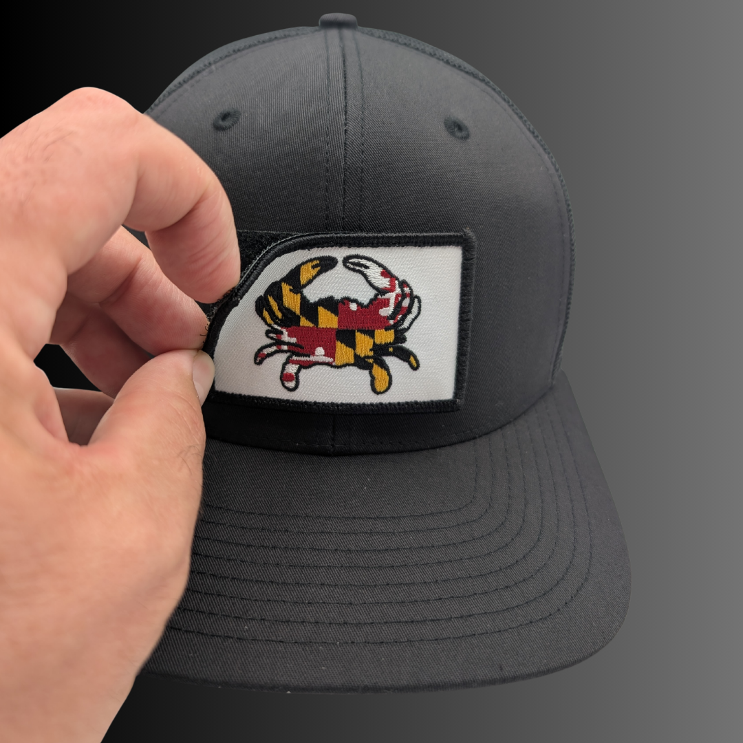 Maryland Flag Crab patch on Richardson 112 trucker hat - RADISH -  Black/Black